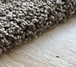 Подгиб края коврового покрытия со стрижкой ворса